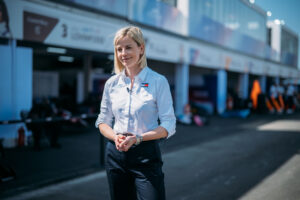 F1: The Academy. Susie Wolff in F1: The Academy Cr. F1 ACADEMY Limited | Parc Fermé’/Courtesy of Netflix © 2025
